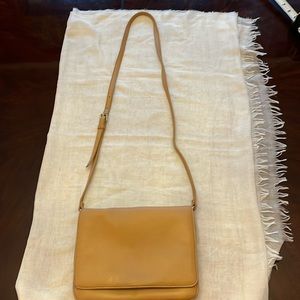 Biscuit colored leather cross-body bag by Talbots.
